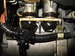BMW electric water pump mounts damaged due to engine oil leak