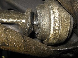 BMW suspension bushing failure due to engine oil leak