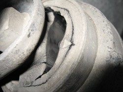 BMW control arm bushing torn due to aged rubber